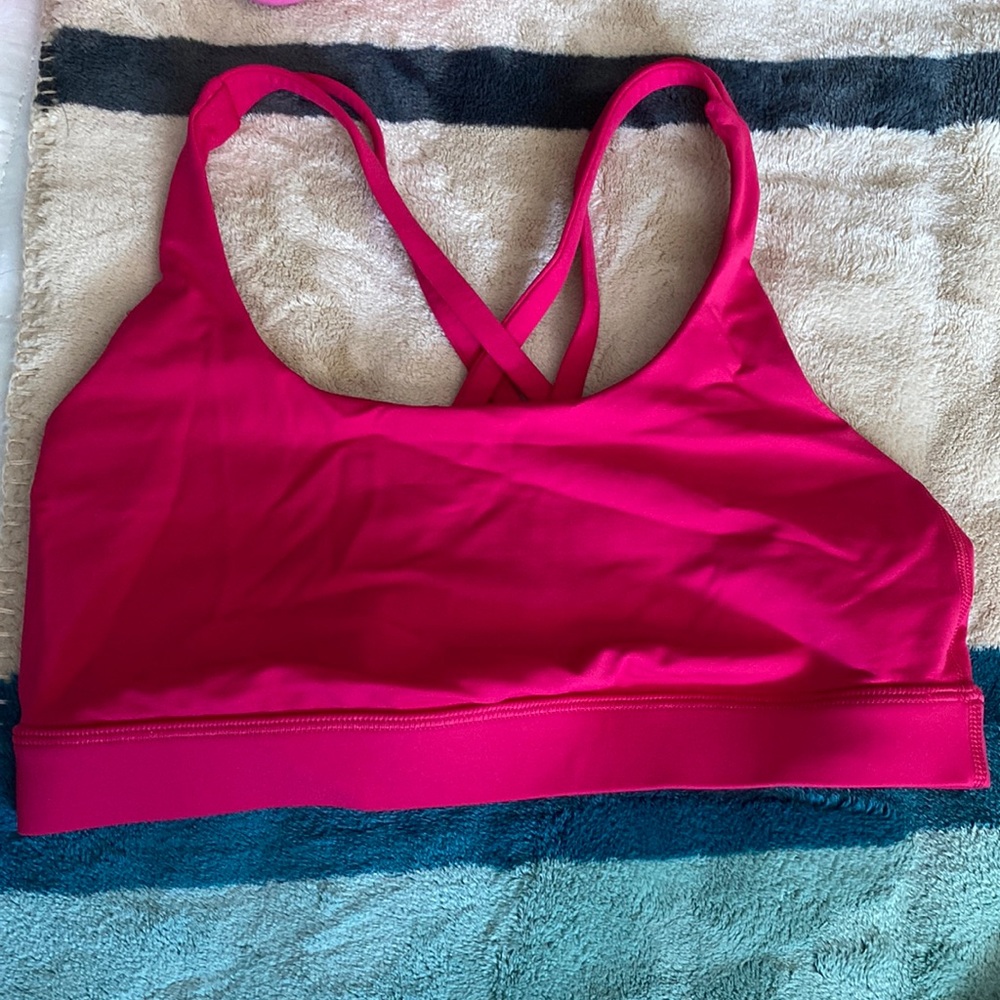 Pink-ish red-ish color lululemon sports bra.